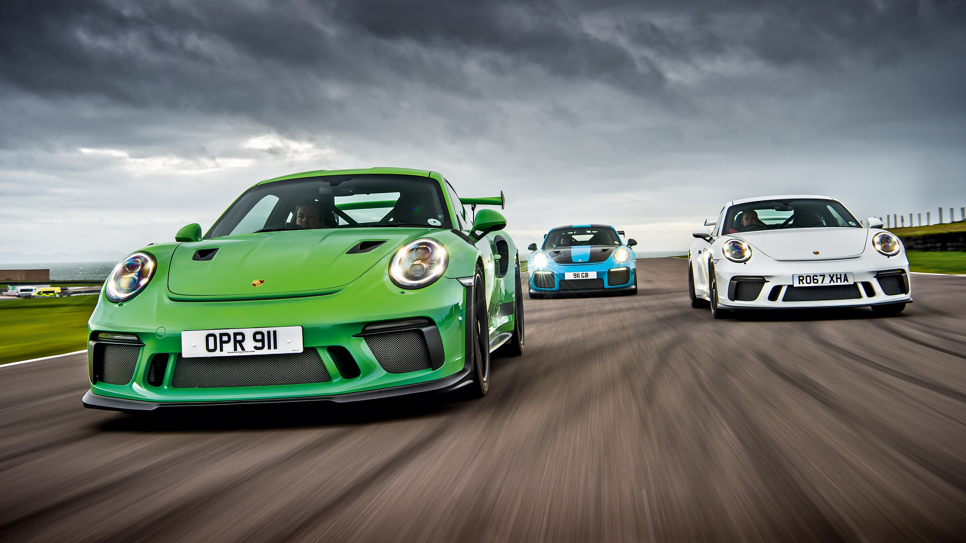 Porsche 911 GT3 vs GT3 RS vs GT2 RS - track battle | evo